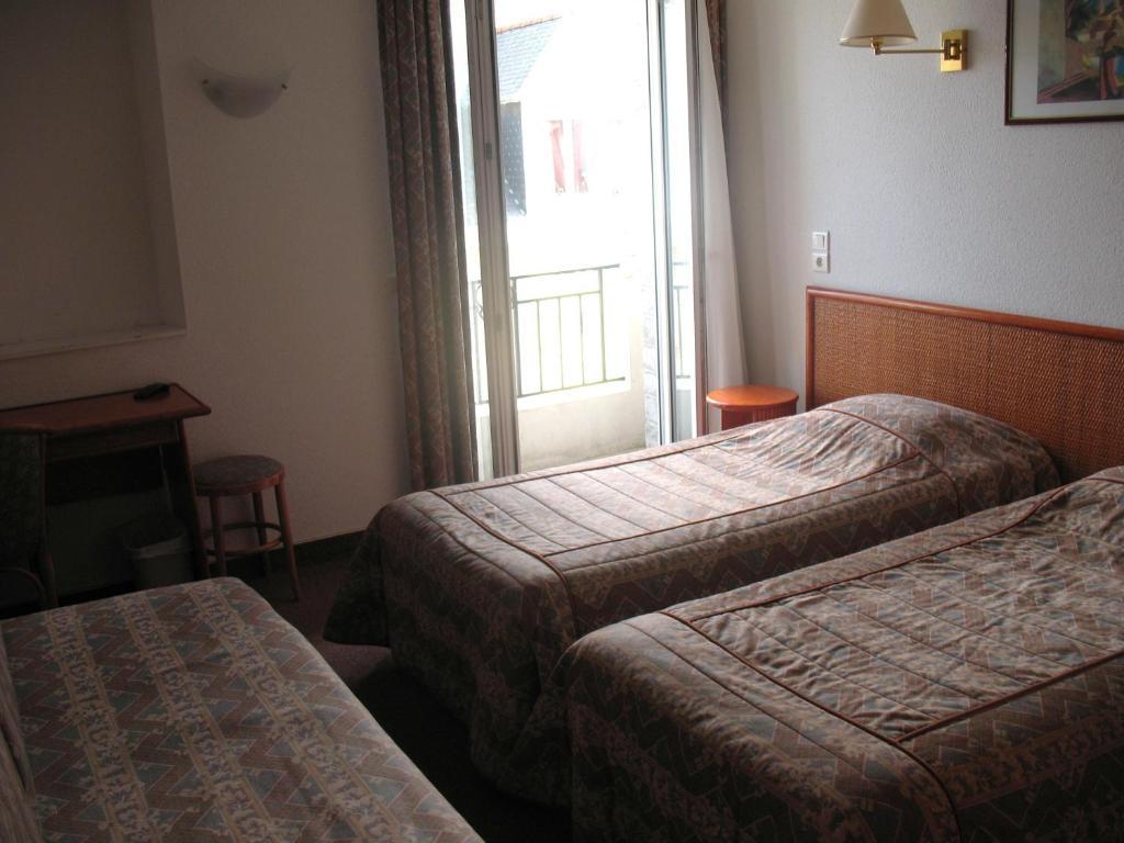 Hotel Les Arcades Saint-Cast-le-Guildo Quarto foto